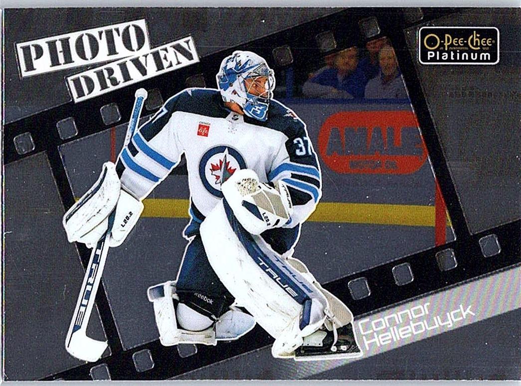 2023-24 O-Pee-Chee Platinum - Photo Driven Connor Hellebuyck #PD-10 front