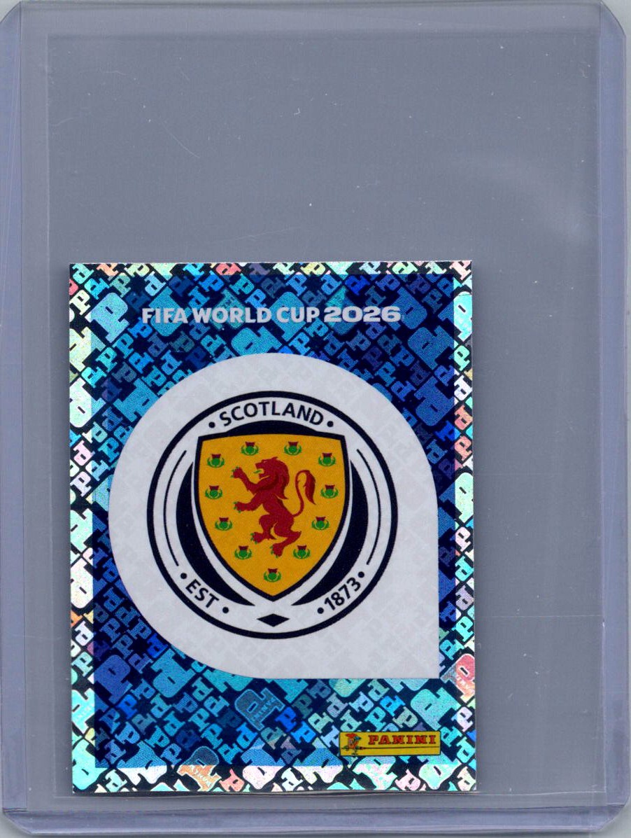2026 Panini FIFA World Cup Stickers International Edition ("Printed in Italy" Back) Emblem FOIL #SCO1 front