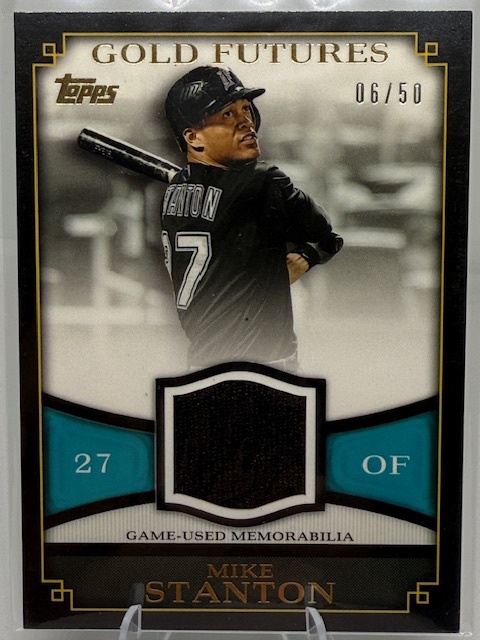 2012 Topps - Gold Futures Relics Mike Stanton #GFR-MS MEM, SN50 front