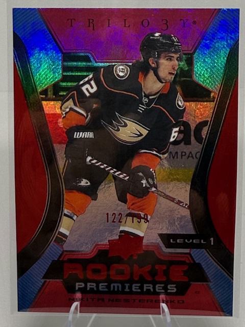 2023-24 Upper Deck Trilogy - Red Nikita Nesterenko #142 SN199 front